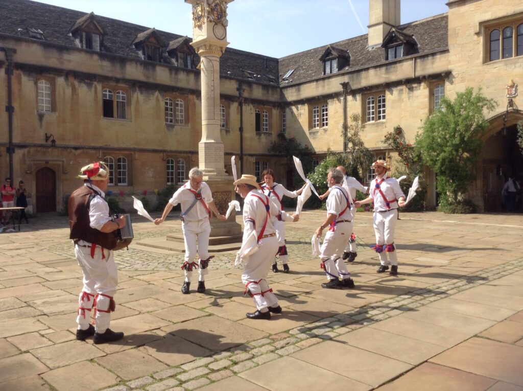 Oxford City Morris dancing at Magdalen College, Oxford, England.